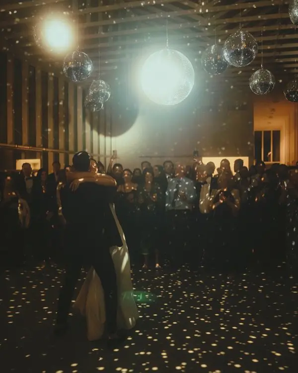 Kelsey and Joe’s moody wedding was nothing short of magical—from the disco ball-lit dance floor to the candlelit reception tables,