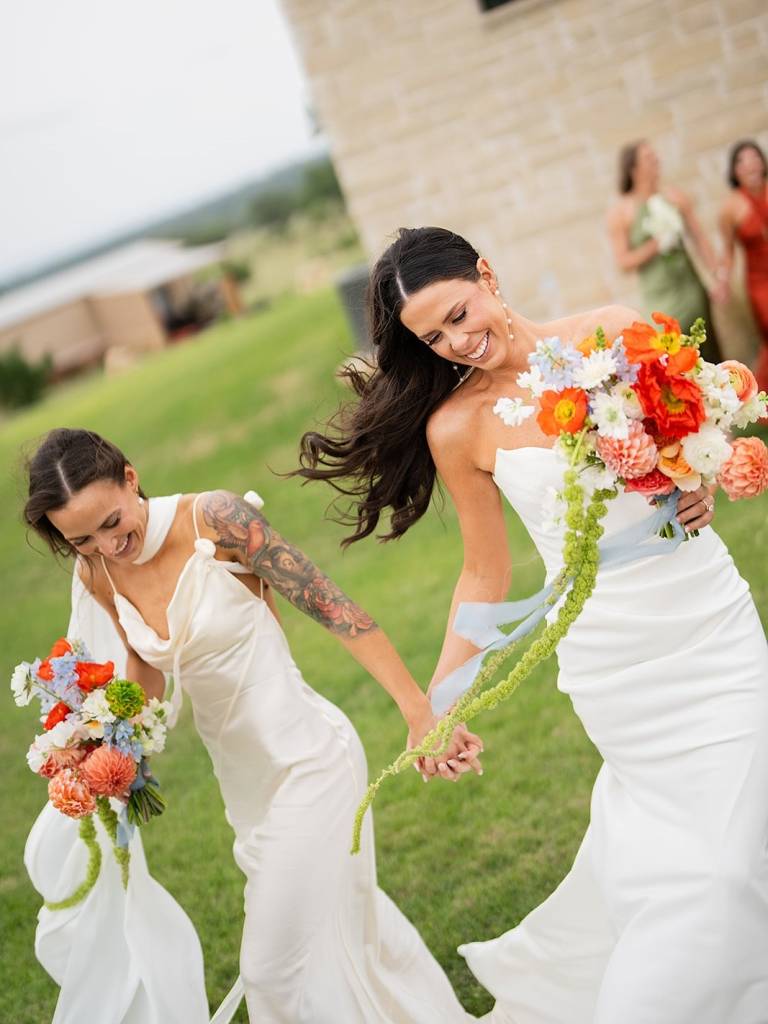 Audrey + Megan took center stage (literally!) and made the most radiant brides. You can feel the love surrounding them