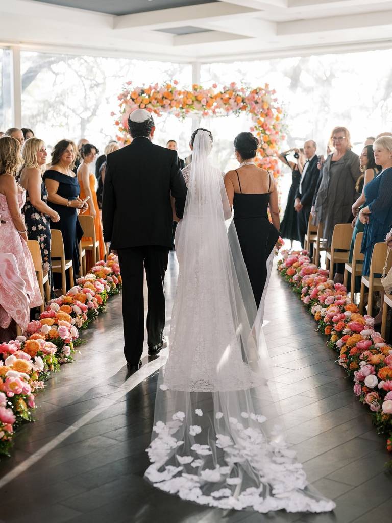 Ashley + Jason took the go big or go home route with their wedding! From the insane florals to the