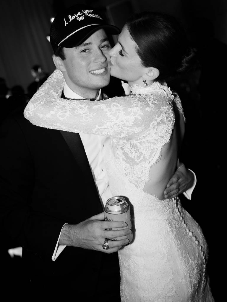 The Walker wedding was a winter dream, from deep green tones and black bridesmaid dresses to a candlelit reception that