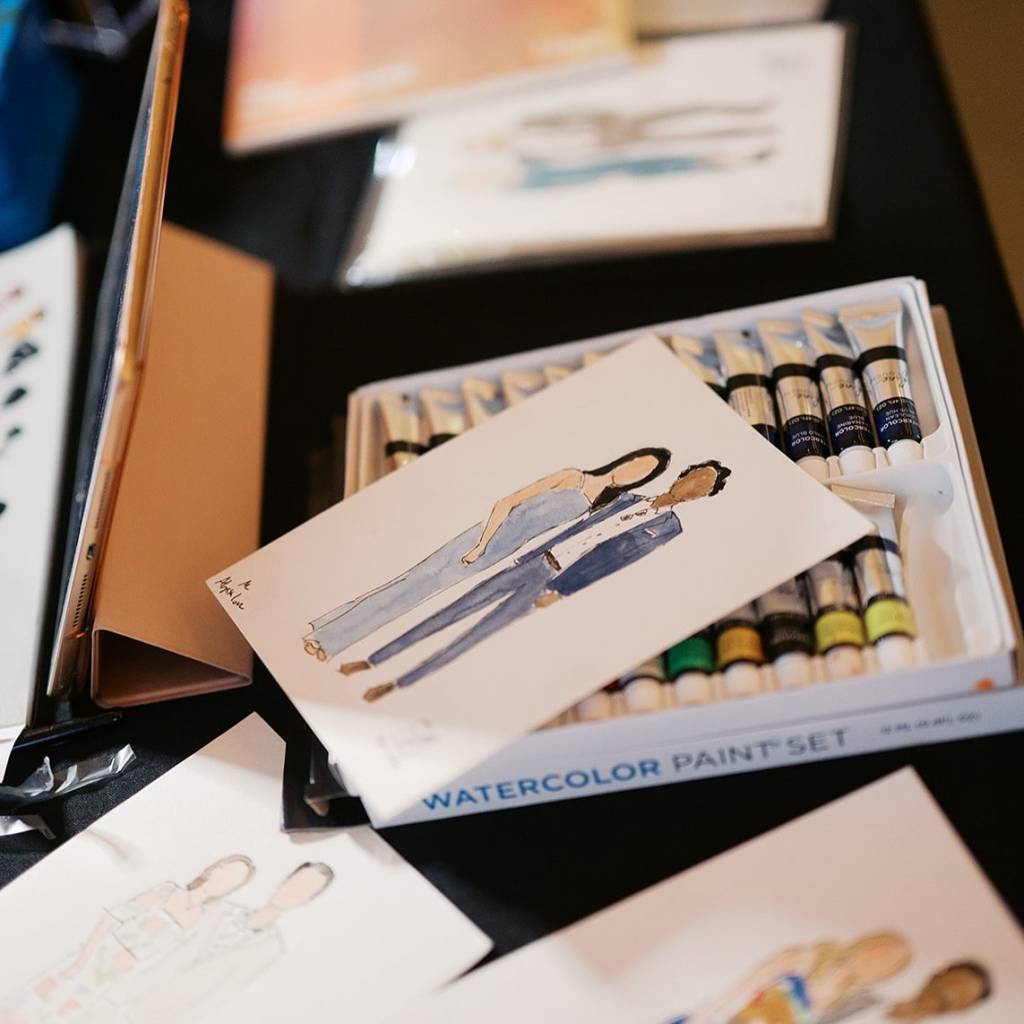 One of the hottest wedding favors right now? A live painter creating custom watercolor portraits for guests. Take a look