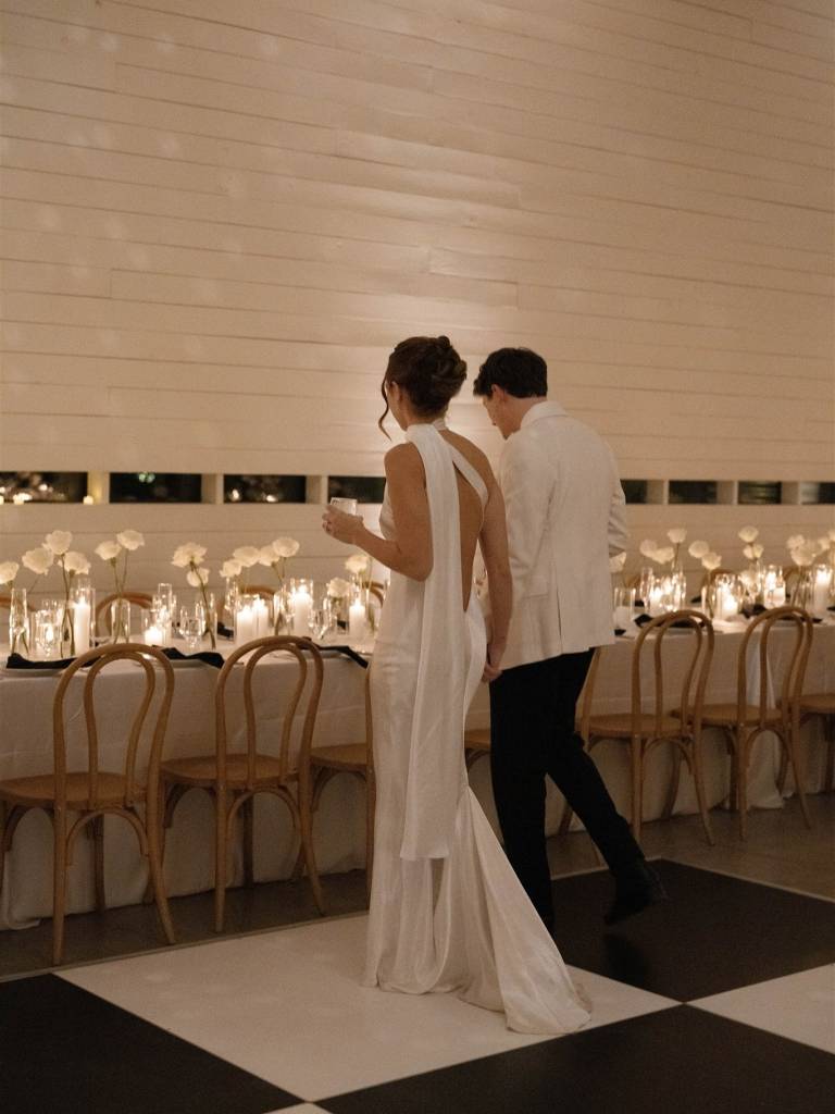 Haley and Sebastian embraced the romance of nightfall, exchanging vows in an emotional candlelit ceremony after sunset. Candles lined the