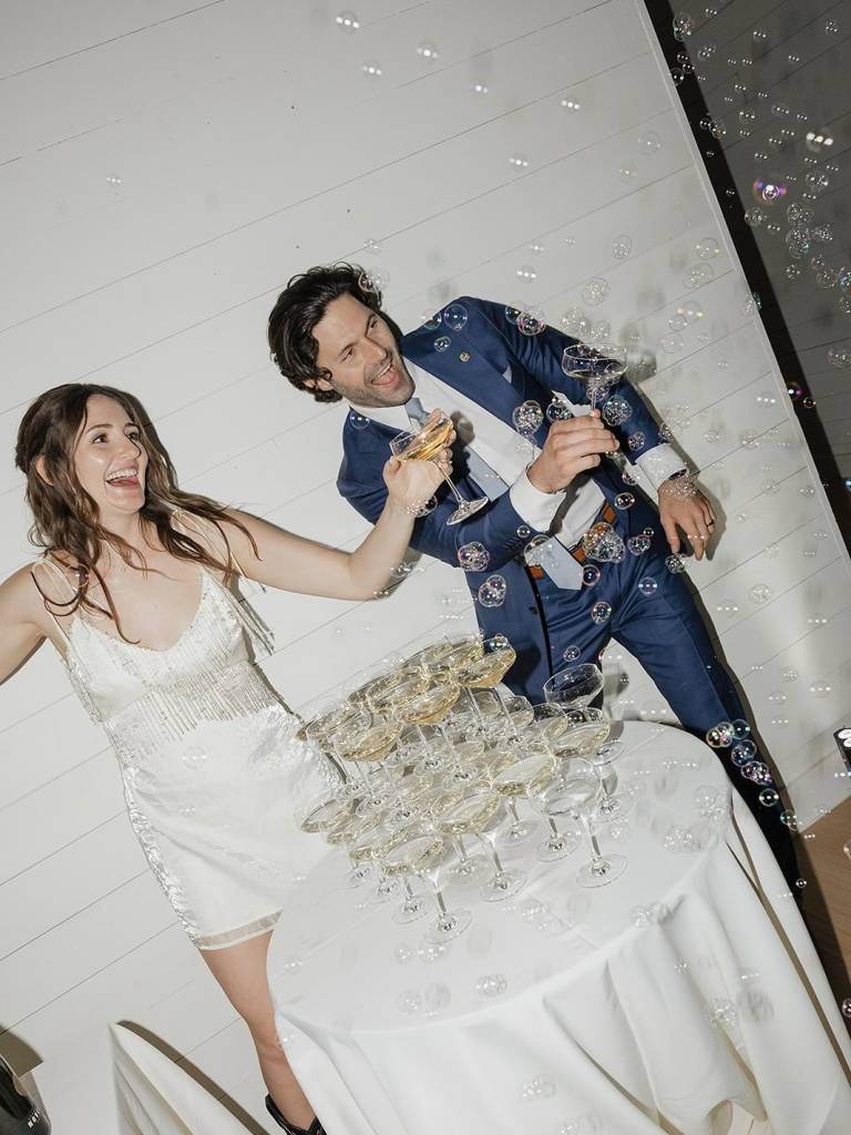 The Schmitz love their bubbles 🥂🫧 •⁠ •⁠ Wed Society | Austin FEATURED vendors:⁠ Venue: prospecthousetx⁠ Photographer: jessie.schultz⁠ ⁠Floral: nativebloomfloraldesign