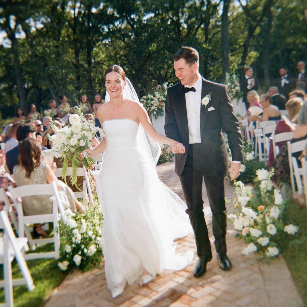 The love between Abby + Pierce was felt in every moment. Their beautiful wedding glowed with classic cream and green