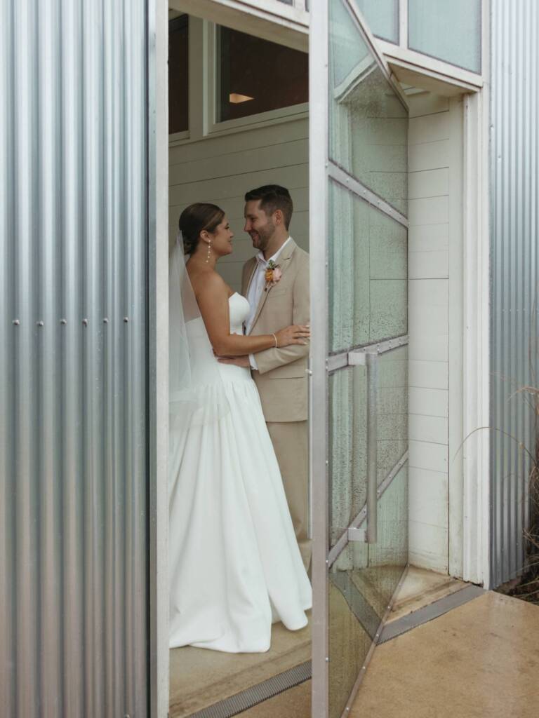 No blues here... just their new last name! 🌧️💙⁠ ⁠ A little rain couldn’t stop M + C from having